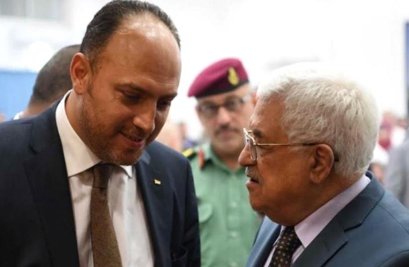 Husam Zomlot and Mahmoud Abbas. (photo credit: Courtesy)