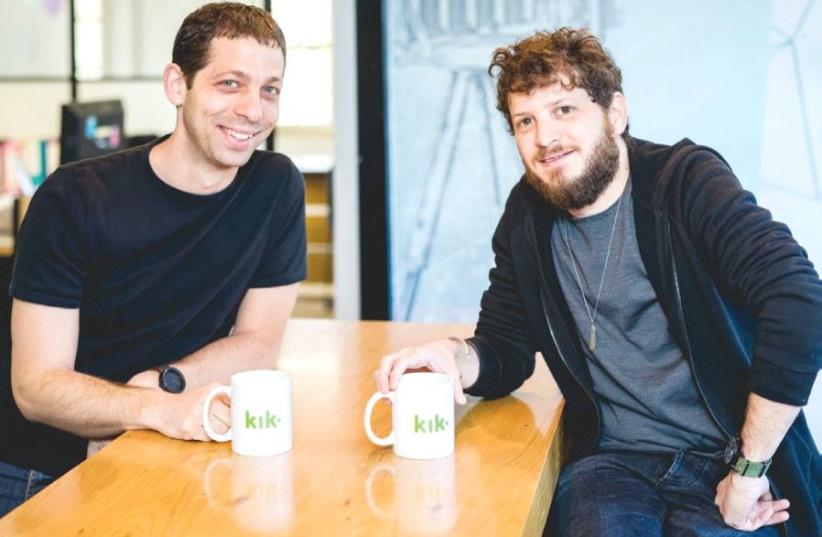 ROUNDS FOUNDERS Dany Fishel (left) and Ilan Leibovich have recently merged their company with Canada’s Kik Interactive. (photo credit: TOMER FOLTYN)