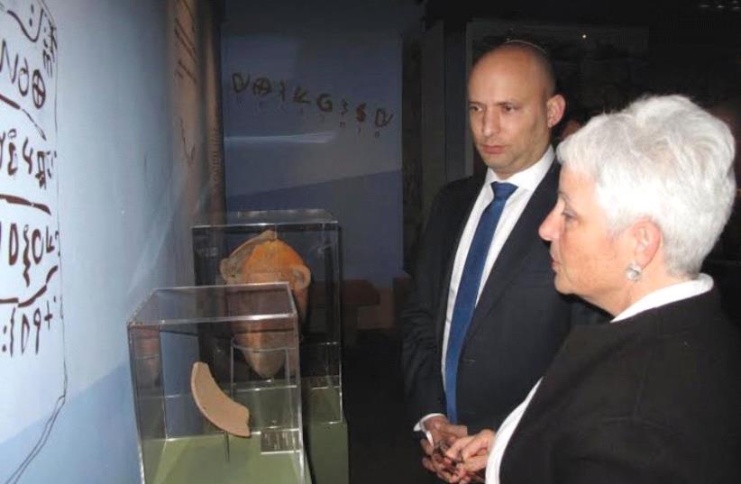 BIBLE LANDS MUSEUM director Amanda Weiss with Education Minister Naftali Bennett (photo credit: Courtesy)