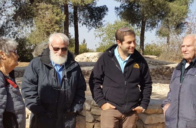 On Ammunition Hill, (from right to left) are Nir Nitzan, who led the charge into the Western Ammunition Hill trench in 1967, Yoram Taharlev, who wrote a famous Hebrew song about Ammunition Hill, JNF's Ammunition Hill Liaison Yoel Rosby and Nitzan's wife, Galia.  (photo credit: AMMUNITION HILL)