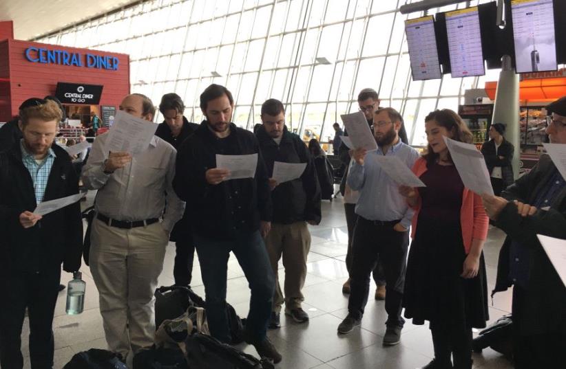 Jewish prayer session held at JFK in solidarity with refugees (photo credit: DANIEL ATWOOD)