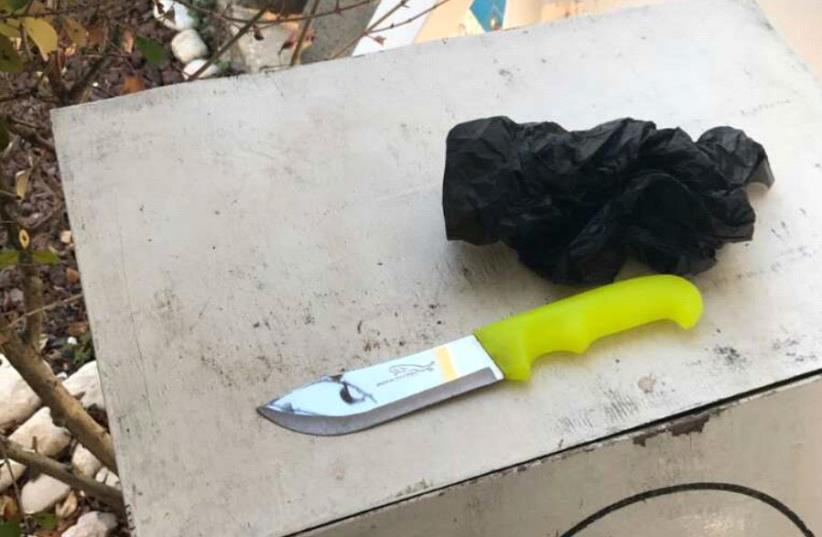 A knife used in an attempted stabbing attack in Hebron. (photo credit: POLICE SPOKESPERSON'S UNIT)