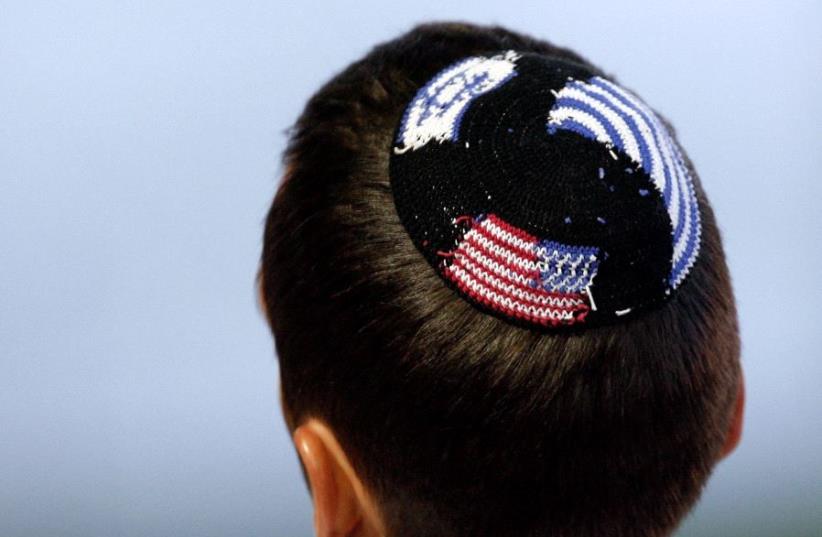 A member of the Jewish community wears a kippa (photo credit: REUTERS)