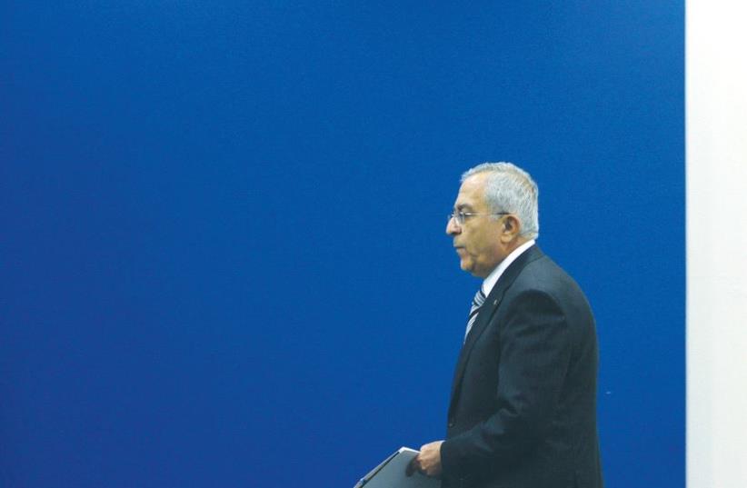THEN-PALESTINIAN AUTHORITY Prime Minister Salam Fayyad arriving at a meeting in Ramallah in 2012. (photo credit: REUTERS)