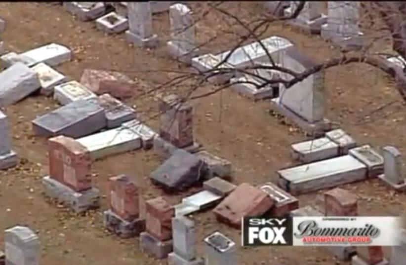 FOX2NEWS broadcasts footage of vandalized headstones at a St. Louis area Jewish cemetery (photo credit: screenshot)