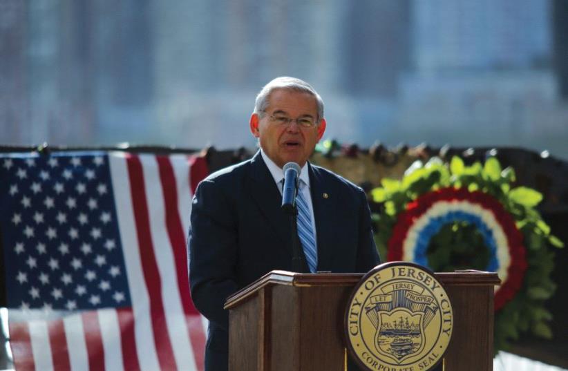 US SENATOR Robert Menendez speaks to the guests as he attends a ceremony for 9/11 victims in 2015. (photo credit: REUTERS)