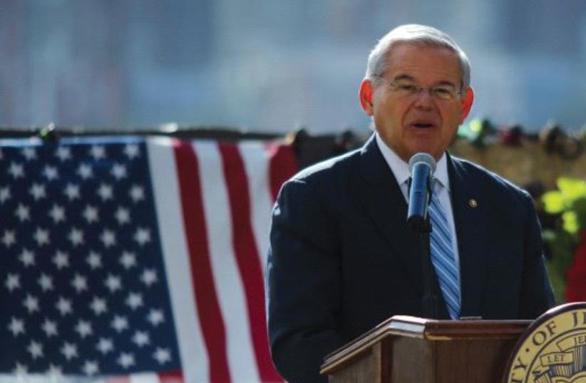 US SENATOR Robert Menendez speaks to the guests as he attends a ceremony for 9/11 victims in 2015. (photo credit: REUTERS)