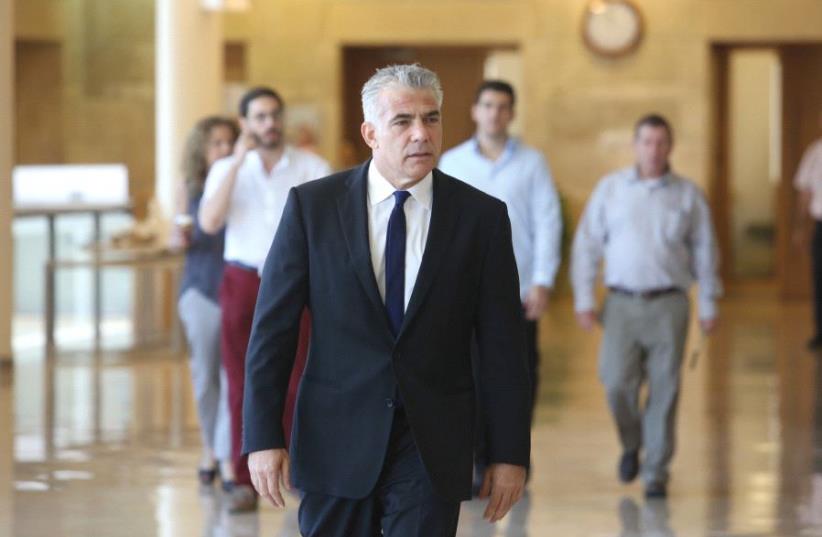 YESH ATID chairman Yair Lapid is on a mission to transform Israel’s entire political culture, aiming to pull it back to the Center. (photo credit: MARC ISRAEL SELLEM/THE JERUSALEM POST)