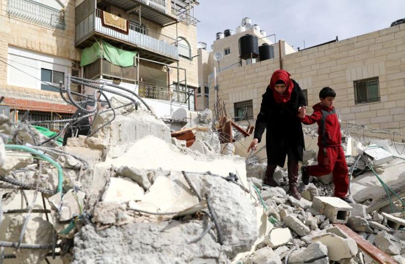 Rubble from a house which was demolished in Jerusalem as they did not have a building permit (photo credit: REUTERS)