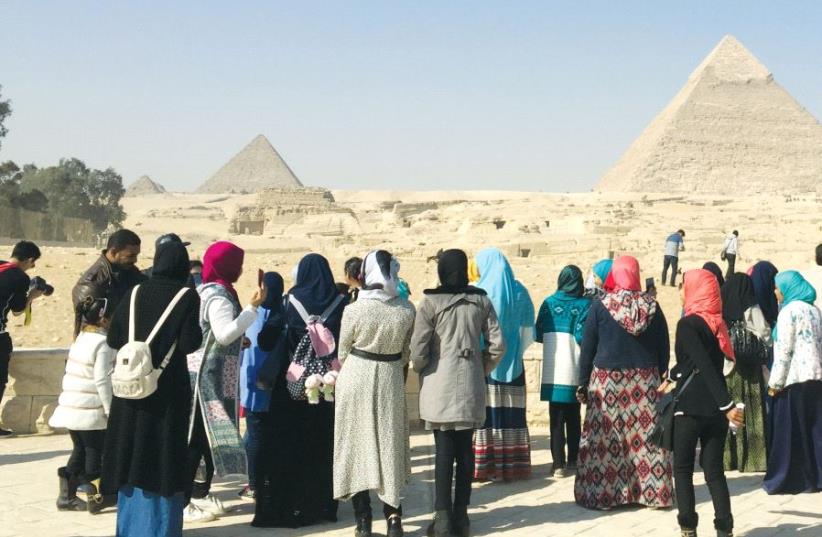 A group of female Egyptian students visits the Pyramids, last month (photo credit: SETH J. FRANTZMAN)