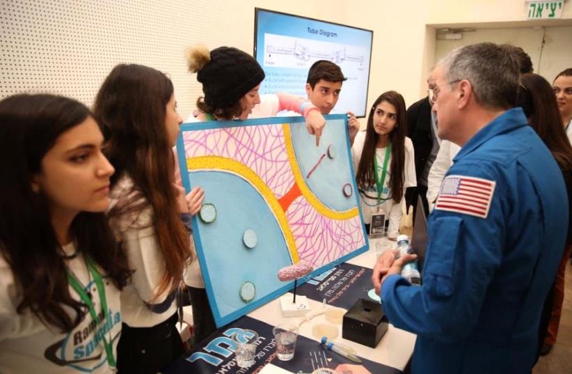 Israeli students presenting experiments to astronauts in February at a SpaceLab event at Bar Ilan (photo credit: RAMON FOUNDATION)