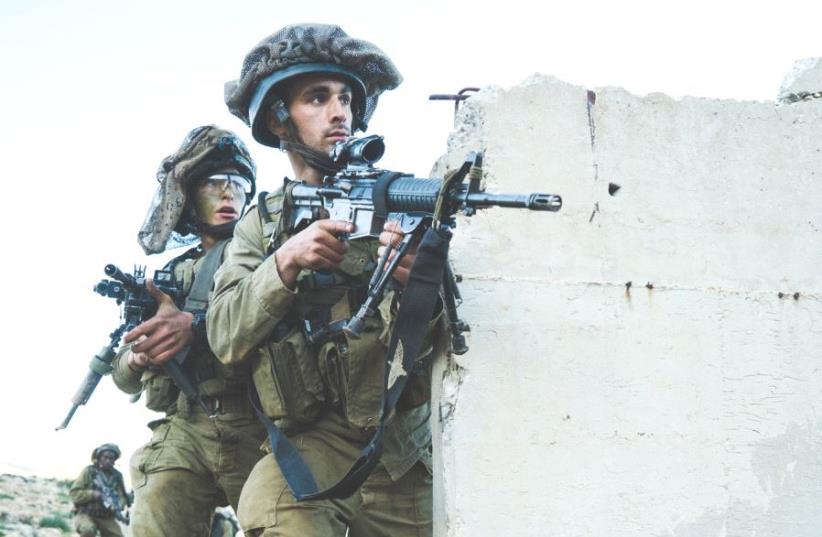 PARATROOPERS TRAIN in urban warfare techniques during last week’s exercise in the Jordan Valley. (photo credit: IDF)
