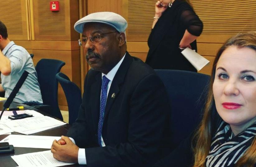 LIKUD MK Avraham Neguise, seated next to Zionist Union MK Ksenia Svetlova, presides over a meeting hosted by the Knesset Immigration, Absorption and Diaspora Committee. (photo credit: Courtesy)