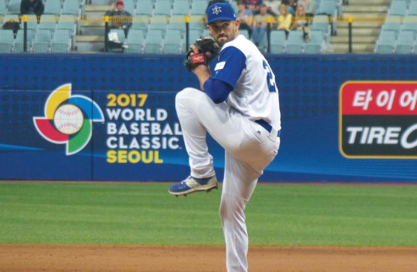 Josh Zeid has been Israel’s most consistent pitcher through the first round of the World Baseball Classic, with a 0.00 ERA in 4.2 innings pitched. The blue-and-white faces Cuba this morning in the opening game of the quarterfinal round in Tokyo (photo credit: MARGO SUGARMAN)
