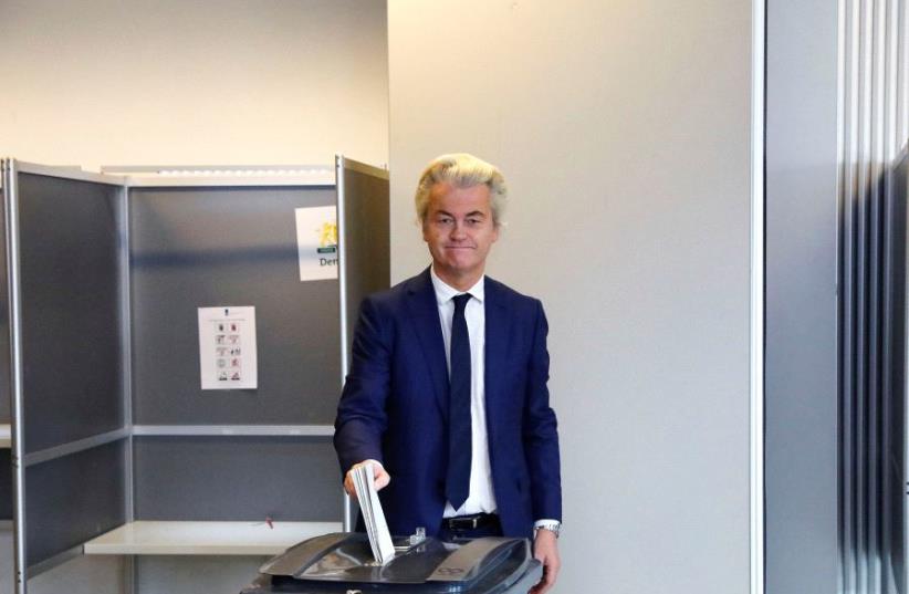 Dutch far-right politician Geert Wilders of the PVV party votes in the general election in The Hague, Netherlands, March 15, 2017. (photo credit: REUTERS)