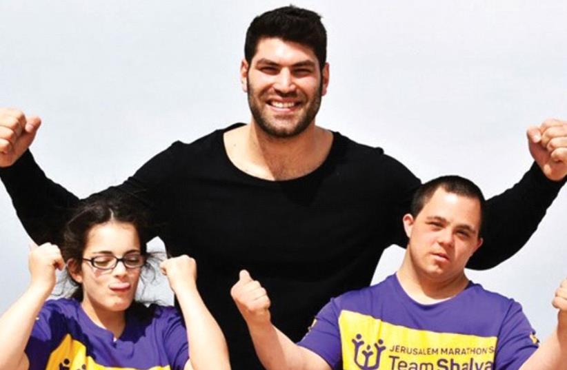 ISRAELI JUDOKA Ori Sasson raises money for Shalva, the Israel Association for Care and Inclusion of Persons with Disabilities. (photo credit: SHALVA)