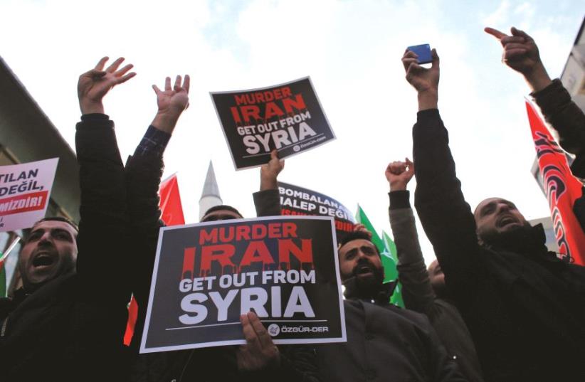 Une manifestation pour le départ de l'Iran de la Syrie (photo credit: REUTERS)
