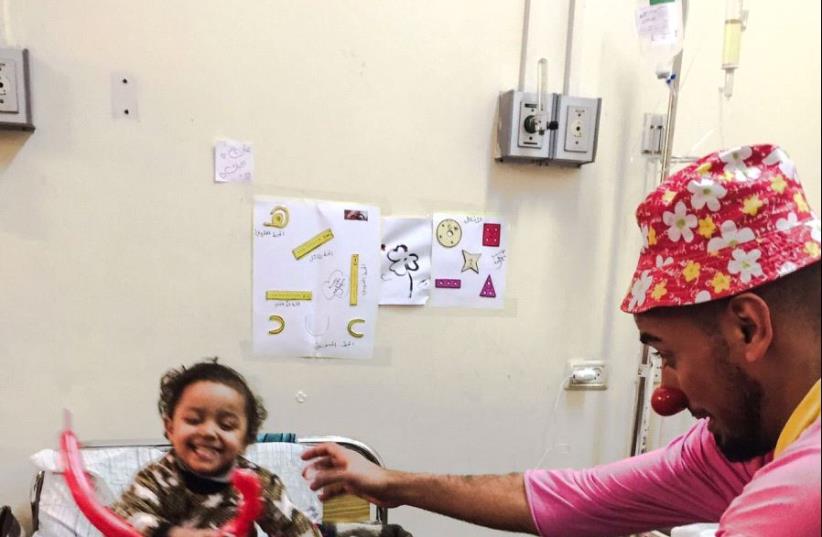 Abdullah Abu Shaaban clowning at al-Rantisi children's hospital in Gaza (photo credit: I CLOWN YOU)