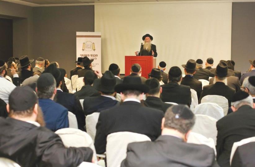 PARTICIPANTS AT THE Rabbinical Center of Europe conference listen as to a speaker address the organization’s 16th annual gathering this week in Pomezia, Italy. (photo credit: IZIK BELINKOV)