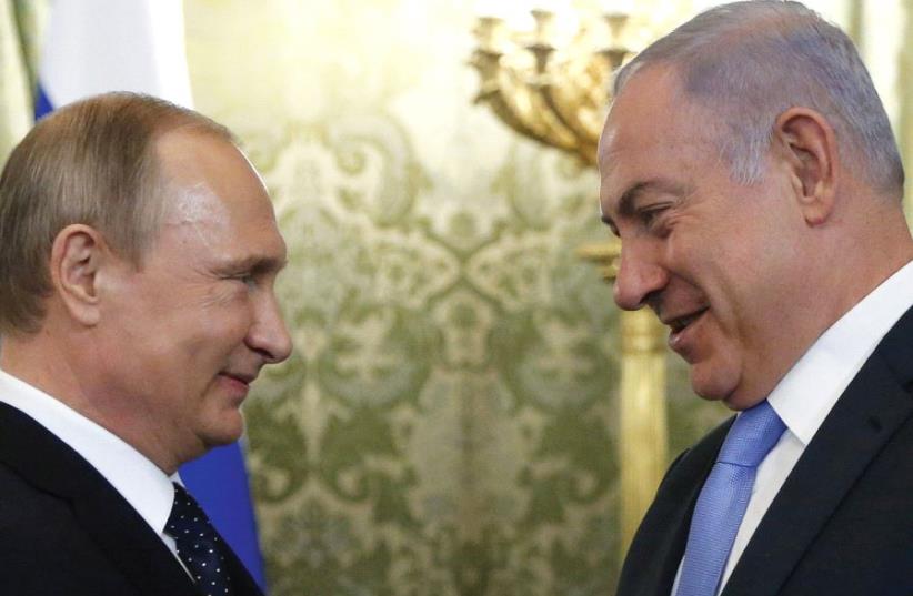 THE TIES between Russian President Vladimir Putin (left) and Prime Minister Benjamin Netanyahu have been characterized as straightforward, open and built on personal trust (photo credit: REUTERS)