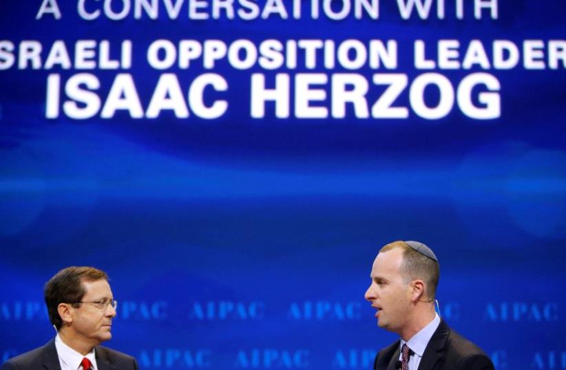 Israeli opposition leader Isaac Herzog (L) is interviewed by Editor-in-Chief of the Jerusalem Post Yaakov Katz. (photo credit: JOSHUA ROBERTS / REUTERS)