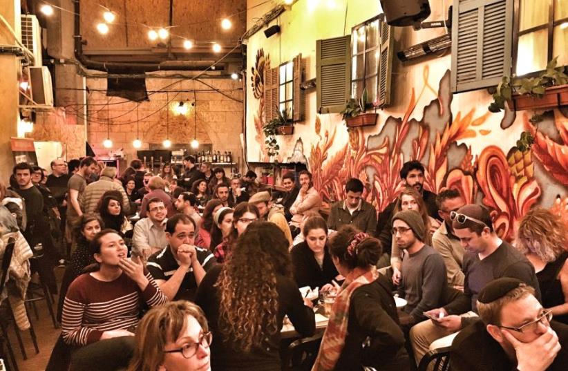 Jerusalem’s Anglo community fills Beer Bazaar (photo credit: LAURA BEN-DAVID)
