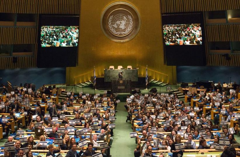 The United Nations GA filled with Israeli flags during anti-BDS summit (photo credit: SHAHAR AZRAN)