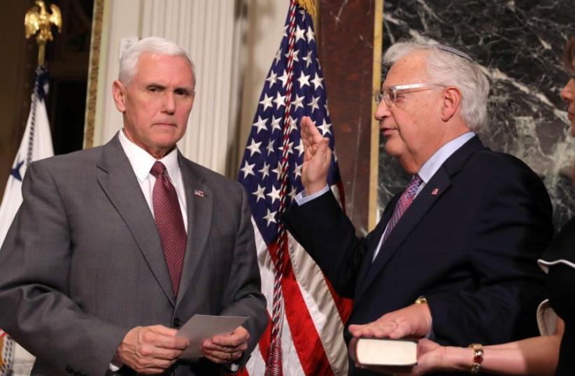 Vice President Mike Pence hosts a swearing in ceremony for US Ambassador to Israel David Friedman (C) at the Executive office in Washington, US, March 29, 2017 (photo credit: REUTERS)