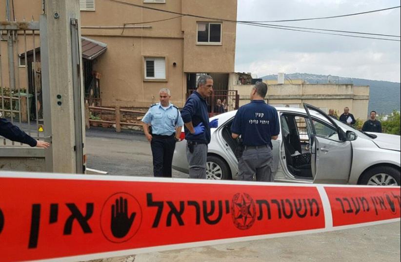 Police at the scene of a crime in Rameh in northern Israel (photo credit: ISRAEL POLICE)