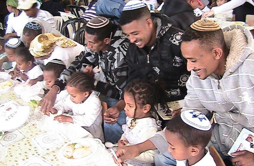 Passover Seder for the Ethiopian community in Jaffa organized by Aviv Hatorah (photo credit: IMMIGRATING WITH SUCCESS)
