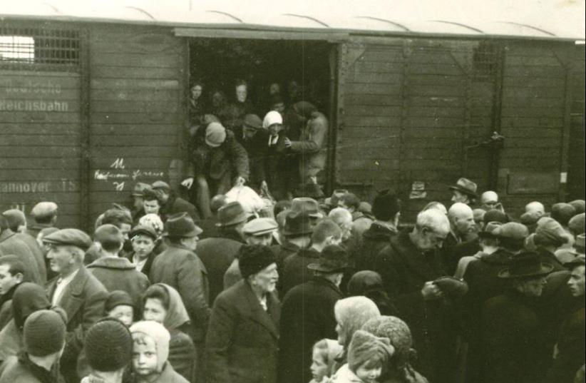 Hungarian Jews disembark from trains at the Auschwitz-Birkenau death camp in the summer of 1944 (photo credit: YAD VASHEM)
