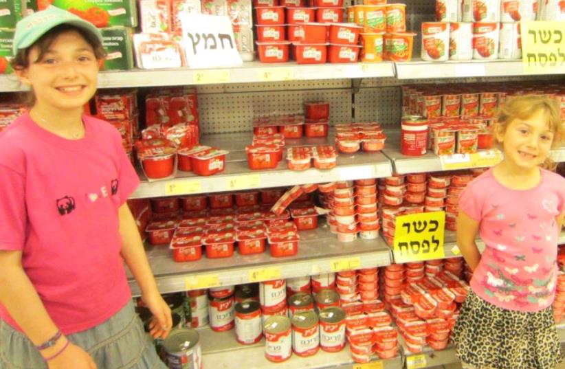 The Resnick childen, who have celiac disease, shop for Passover food (photo credit: YAEL RESNICK)