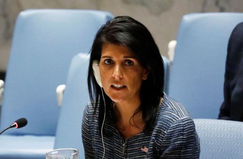 US Ambassador to the United Nations Nikki Haley addresses the United Nations Security Council at the United Nations Headquarters in New York City, US, April 4, 2017. (photo credit: REUTERS/BRENDAN MCDERMID)
