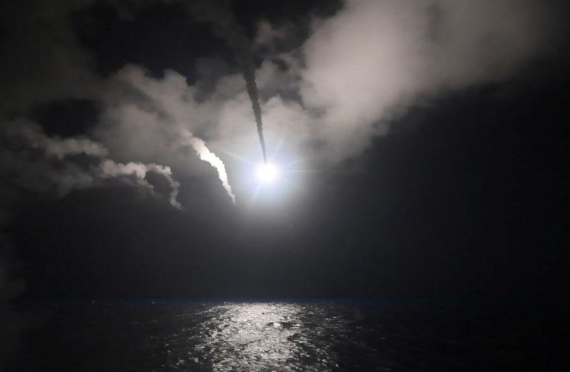US Navy guided-missile destroyer USS Porter (DDG 78) conducts strike operations while in the Mediterranean Sea which US Defense Department said was a part of cruise missile strike against Syria on April 7, 2017 (photo credit: REUTERS)