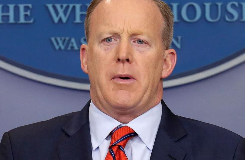 White House Press Secretary Sean Spicer speaks during a press briefing at the White House in Washington, US, April 11, 2017 (photo credit: REUTERS)