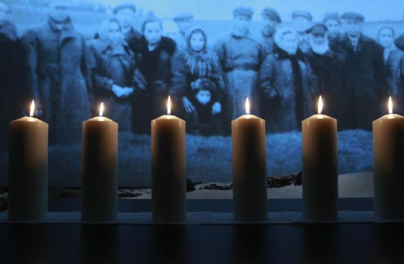 Commemorative candles to mark International Holocaust Remembrance Day (photo credit: REUTERS)