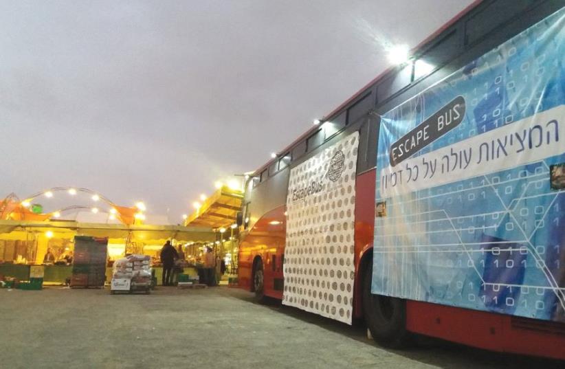 Escape room with a twist: The A-Maze Escape Bus at the First Station (photo credit: PR)