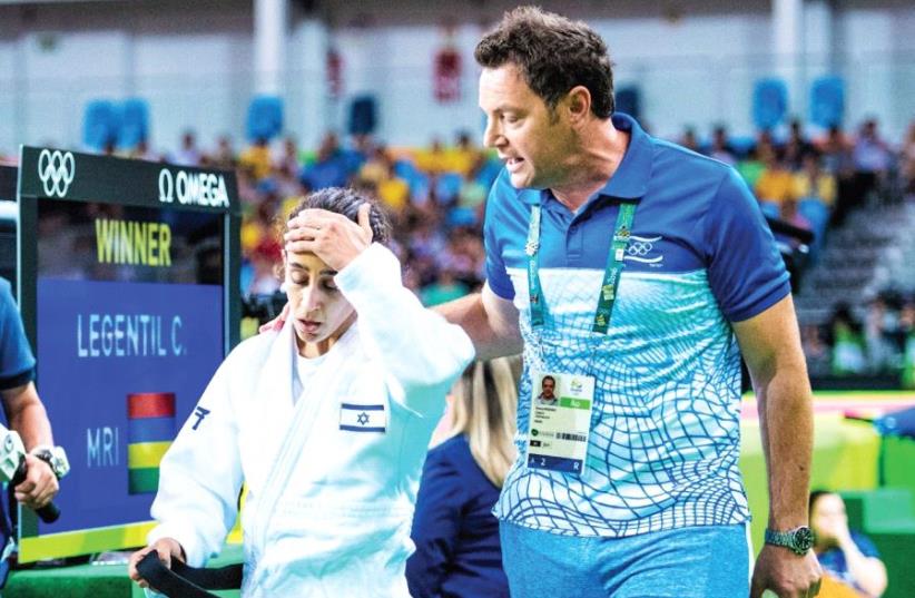 Gili Cohen (left) was one of the Israel delegation’s biggest disappointments at the European Championships in Warsaw, with none of women’s national team coach Shani Hershko’s (right) judokas managing to scale the podium (photo credit: ASAF KLIGER)