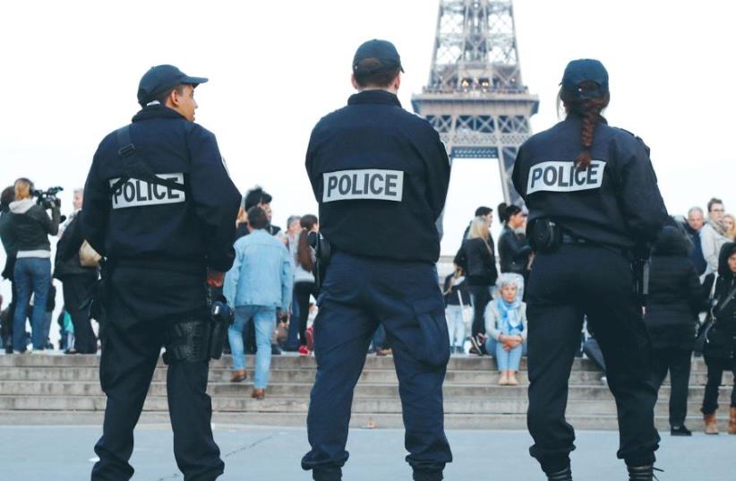 POLICE PATROL the Trocadero area, across the Seine River from the Eiffel Tower, in Paris (photo credit: REUTERS)