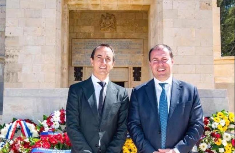 Australian Ambassador Dave Sharma (left) and Josh Frydenberg Minister for  Environment and Energy  at the Commonwealth War Graves Cemetery in Jerusalem where Jewish ANZACs are also buried (photo credit: AUSTRALIAN EMBASSY FACEBOOK)