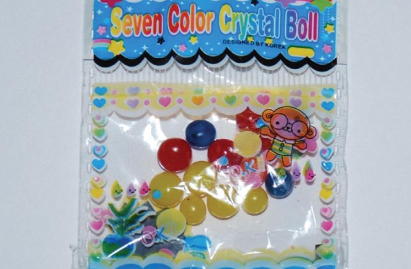 THIS PACKAGE of gel toy balls can be dangerously mistaken by small children as candy. (photo credit: Courtesy)