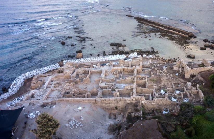An aerial view of the work in the Caesarea National Park's harbor. (photo credit: GRIFFIN AERIAL PHOTOGRAPHY)