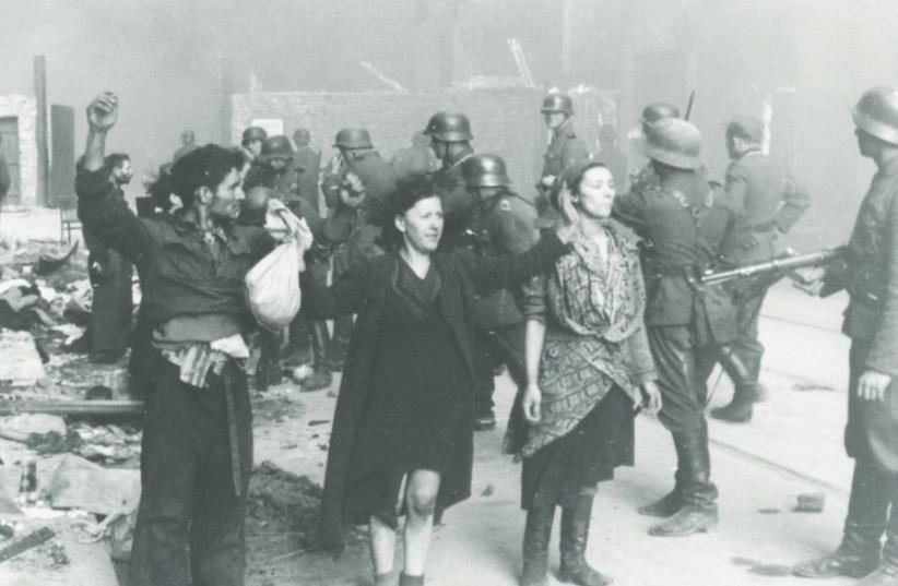A scene from the Warsaw Ghetto Uprising in 1943 (photo credit: Wikimedia Commons)