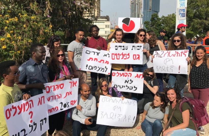 Protesters outside the Tel Aviv Museum of Art on Thursday (photo credit: ELIYAHU KAMISHER)