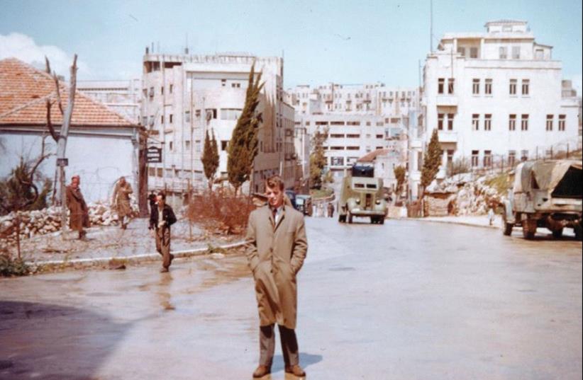 Robert F. (Bobby) Kennedy standing on Julian’s Way, Jerusalem, known today as King David Street, April 1948. Barbed wire and a British Army checkpost can be seen in the background (photo credit: PHOTO COURTESY OF THE KENNEDY FAMILY/RFK MEMORIAL /JOHN F. KENNEDY LIBRARY)