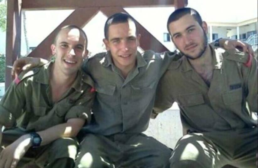Fallen IDF lone soldier Max Steinberg with fellow soldiers (photo credit: Courtesy)