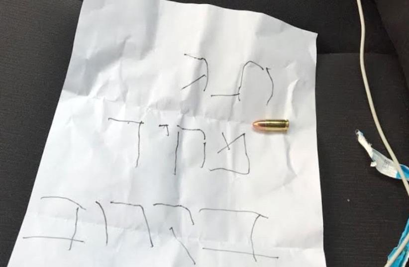 Threatening letter and bullet found in Ramat Hasharon mayor's car (photo credit: GONEN ALIASI)