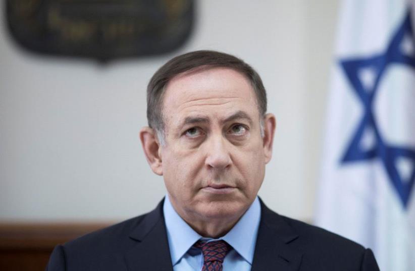 Prime Minister Benjamin Netanyahu with curiously dark hair. (photo credit: REUTERS)