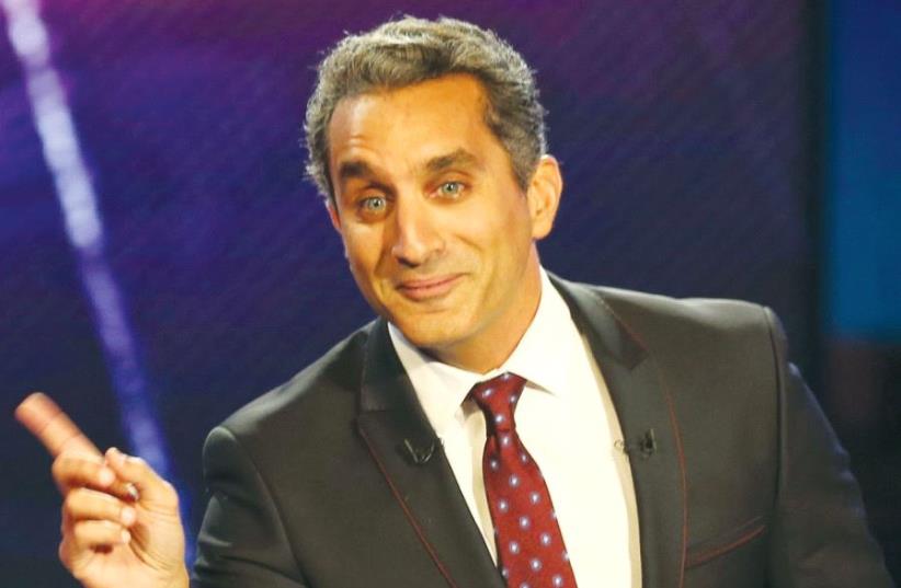 Egyptian satirist Bassem Youssef talks during a news conference in Cairo in 2014 (photo credit: REUTERS)