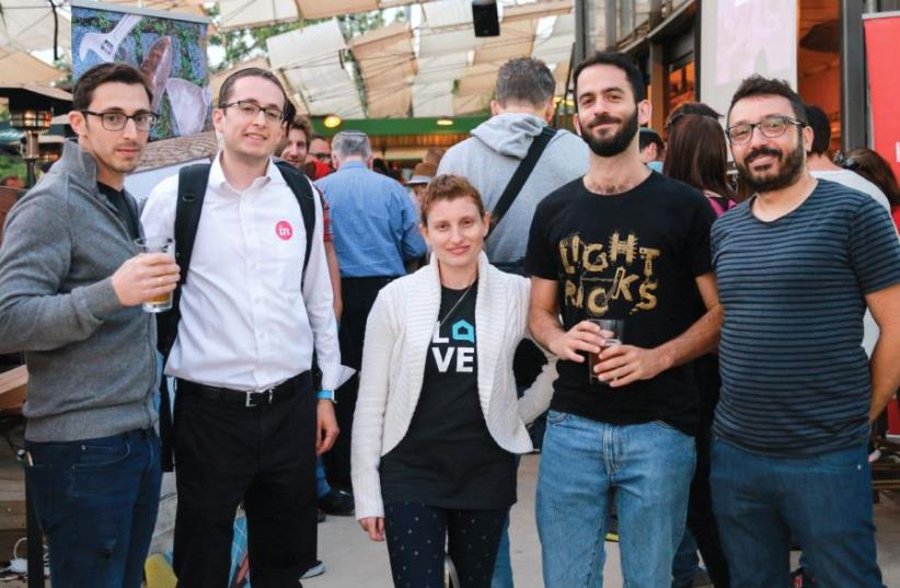 Design gurus: (left to right) Sagi Shrieber, co-founder of Hacking UI; Scott Simcha Markovits, customer advocate at Invision; Tova Safra, senior product designer at Hometalk; Tal Sznicer, lead designer and product manager at Lightricks; and Ohad Aviv, co-founder and CEO at Muzli (photo credit: RICKY RACHMAN)